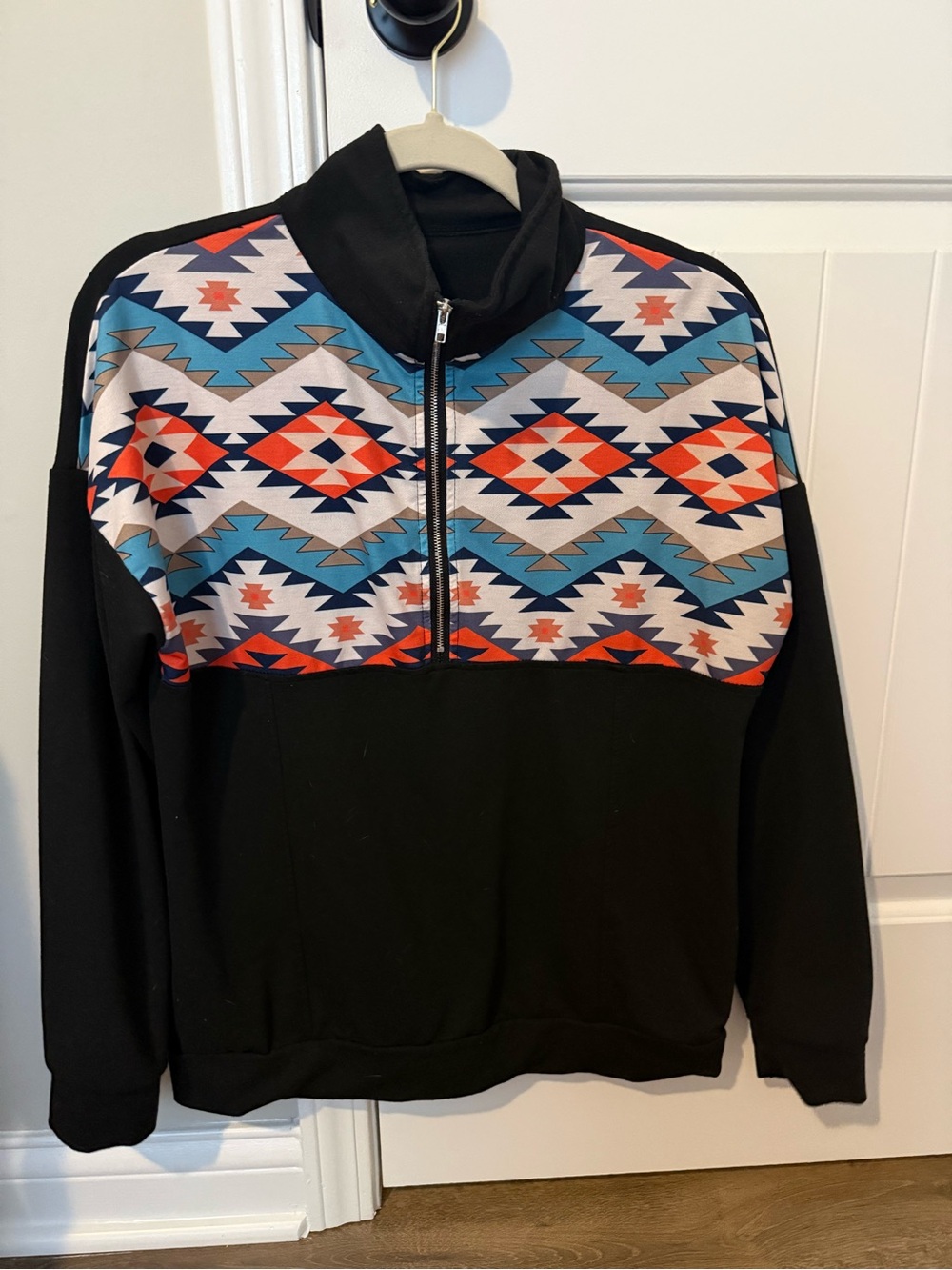 Woman’s Black Quarter-Zip Sweater with Southwestern Geometric Panel